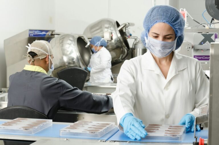 Food production staff in protective clothing