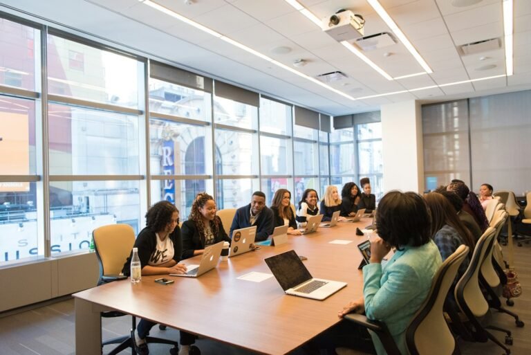Professionals collaborating at a meeting table
